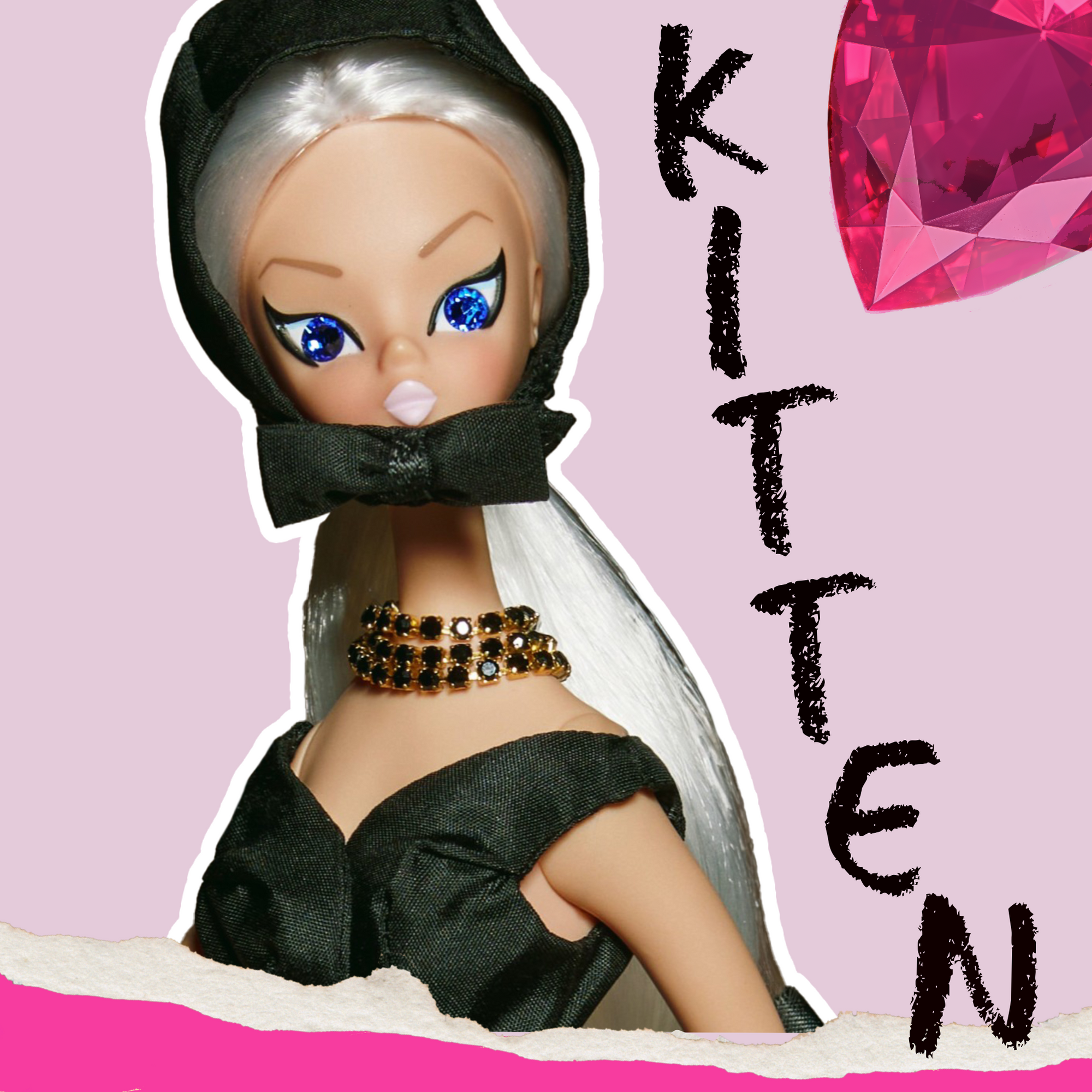 Kitten dressed in black "Bonnette"