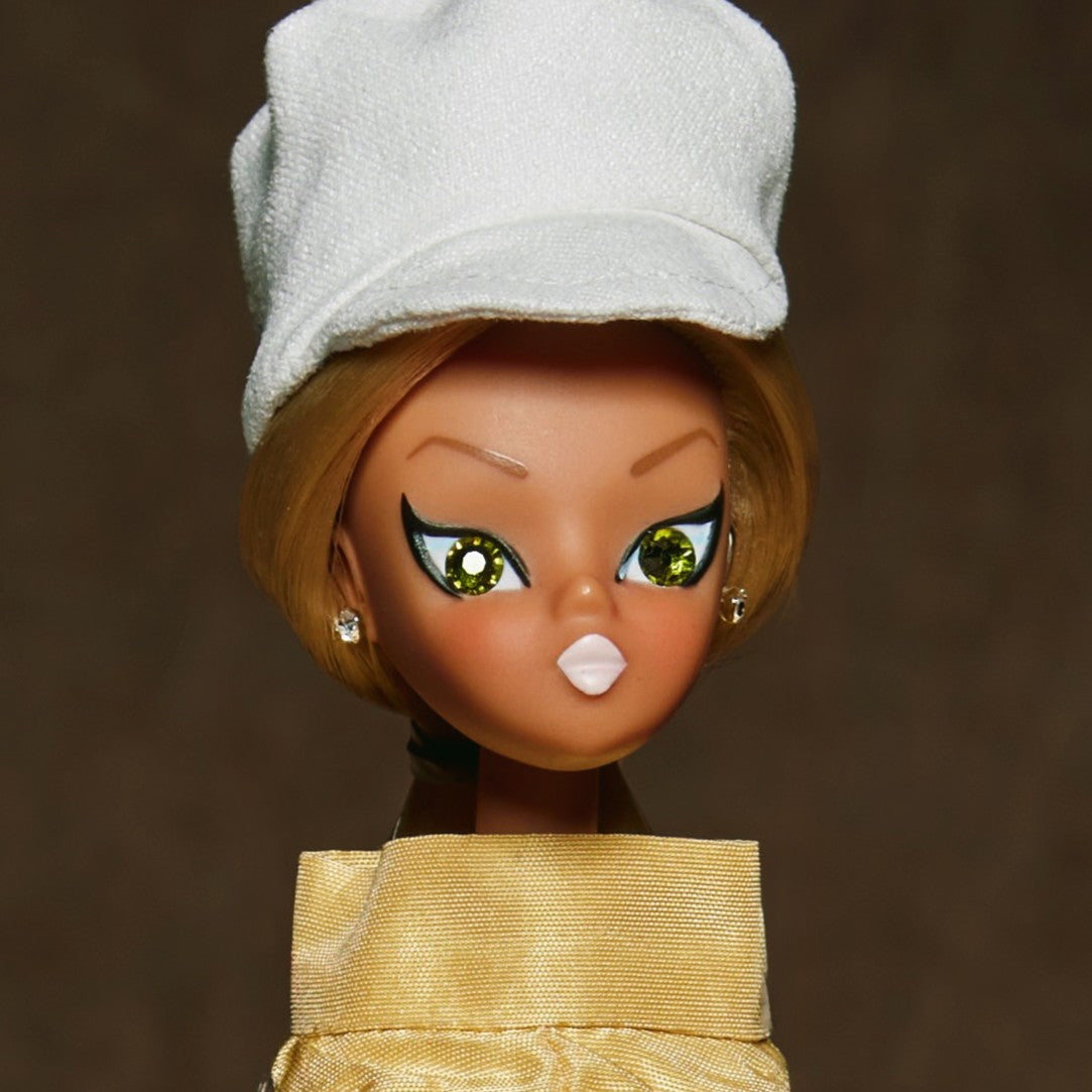 Gogo dressed in mustard "Majorette"